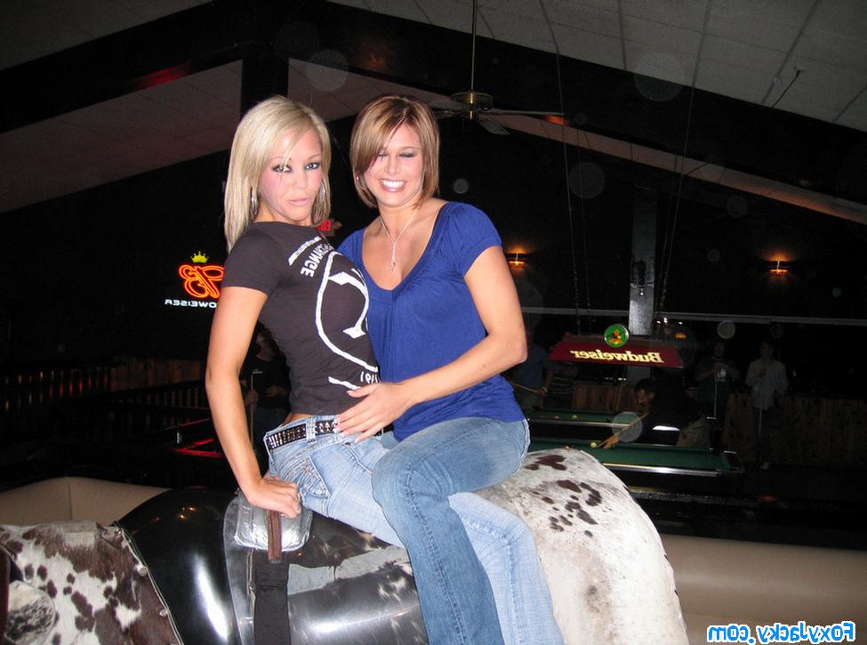 16P Melissa and Jacky riding on the mechanical bull together