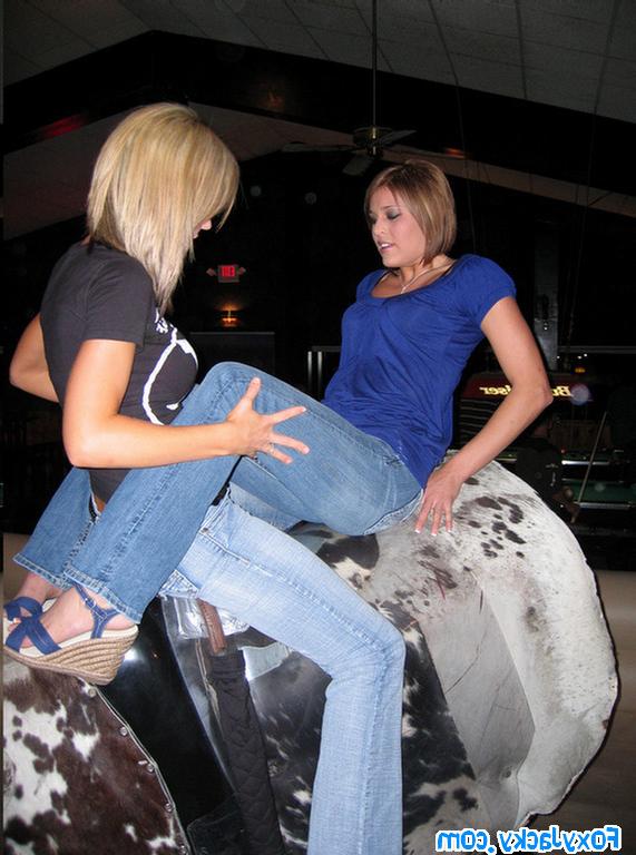 16P Melissa and Jacky riding on the mechanical bull together