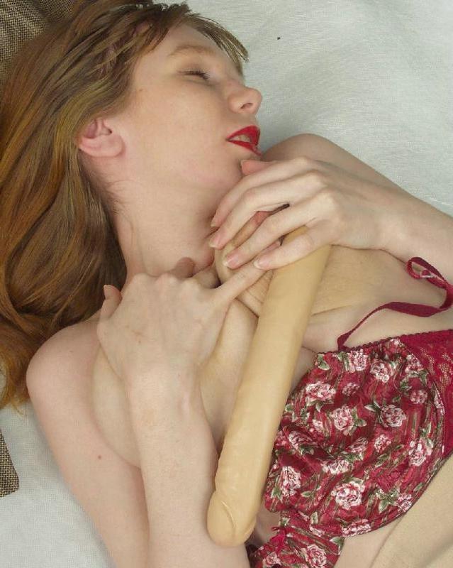 20P Horny strip teasing milf rubbing a dildo on her big tits