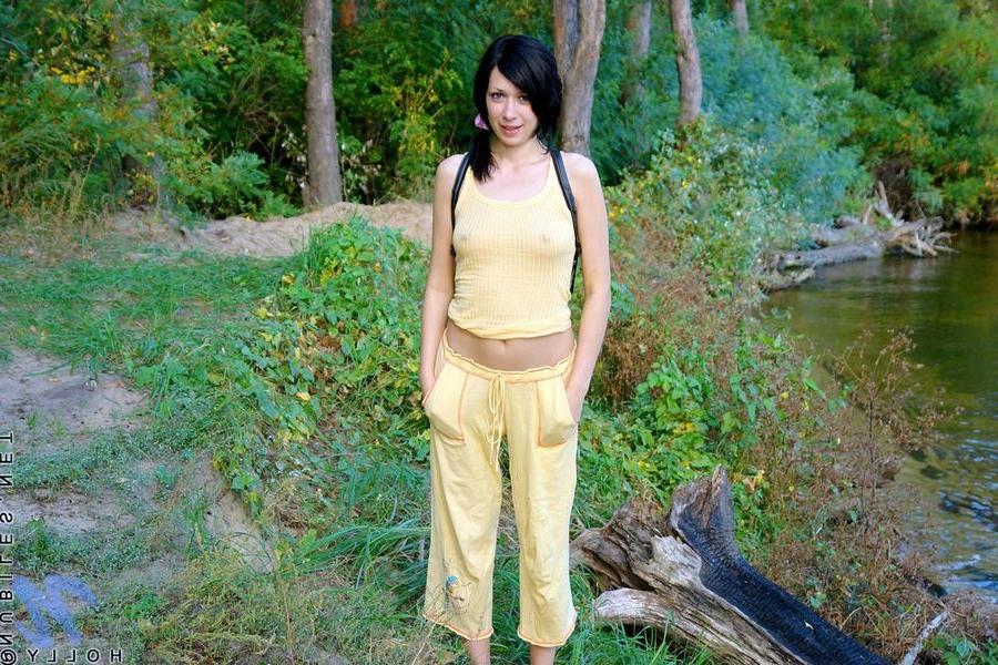 15P Petite Holly treking outdoors with big hard nipples