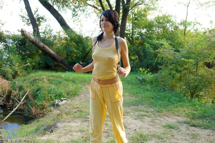 15P Petite Holly treking outdoors with big hard nipples