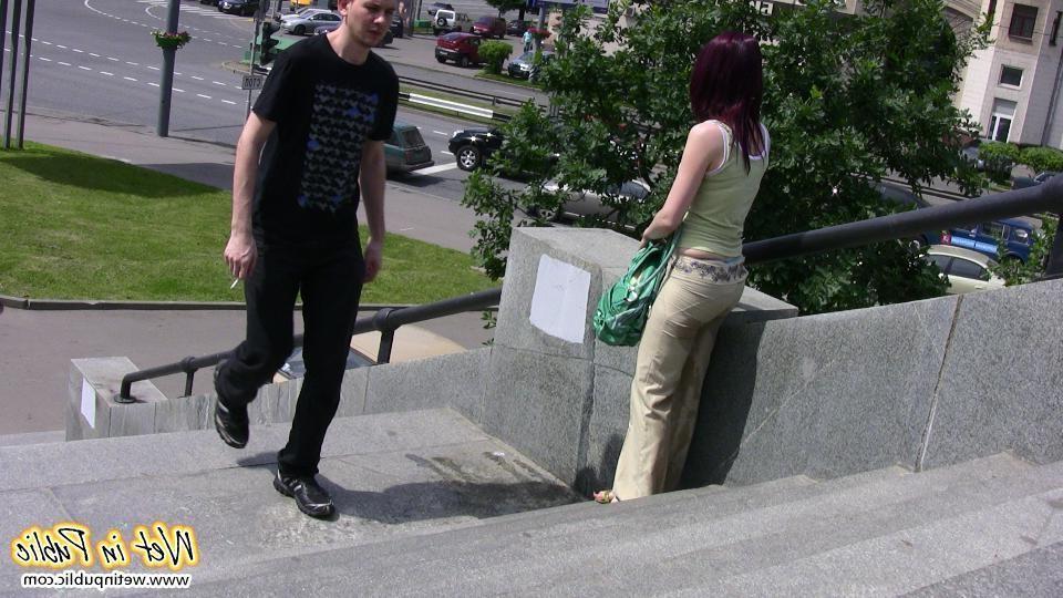 12P Red-haired gal wets her pants and takes a pissing tour around the city