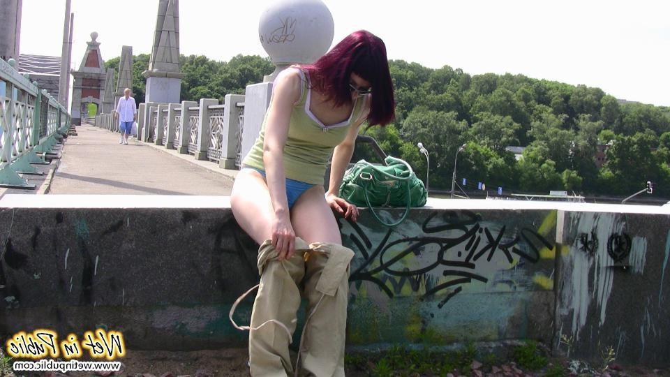 12P Red-haired gal wets her pants and takes a pissing tour around the city