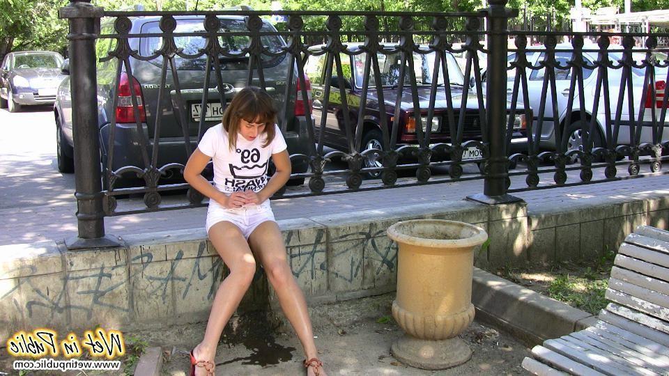 12P Public pissing shame of a babe in the white shorts and her nude pussy
