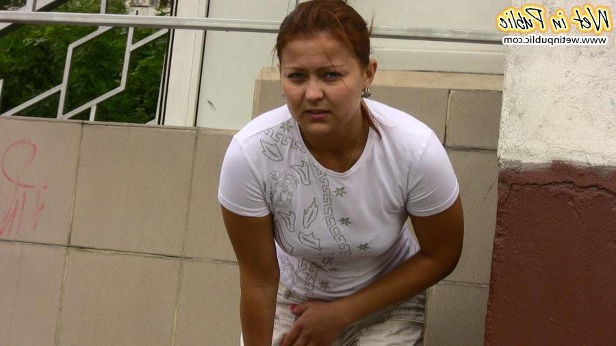 12P Confused babe desperately tries to hide her public pissing disgrace