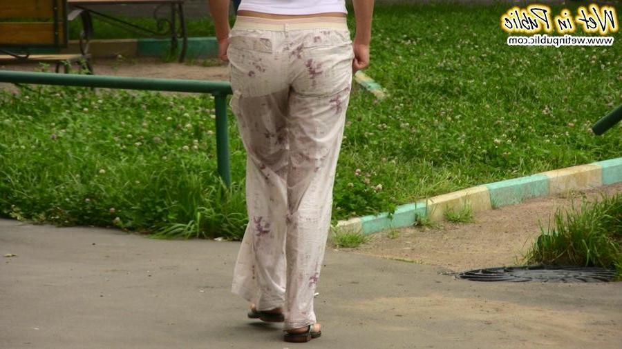 12P Confused babe desperately tries to hide her public pissing disgrace