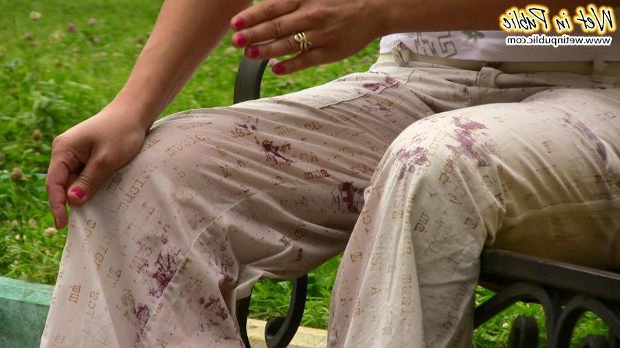12P Confused babe desperately tries to hide her public pissing disgrace