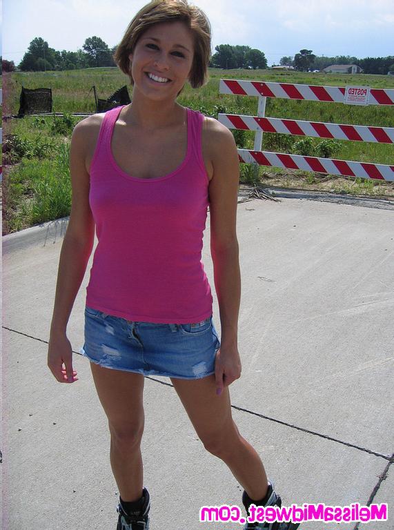 16P Slut shows off her bare pussy outdoors in an upskirt shot