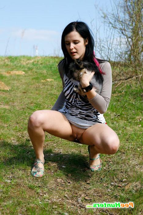 16P Glamorous chick with little doggy filmed pissing