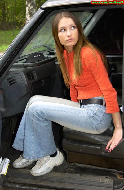 15P Handsome girl peeing near her car after long trip