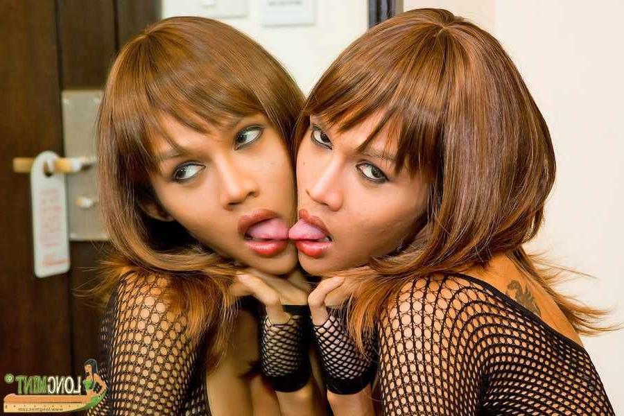 16P Hot ladyboy with a dildo