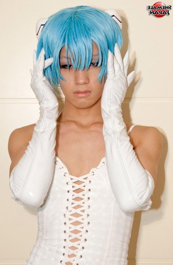 15P Hard Asian Ladyboy In A Blue Wig And White Hip Boots