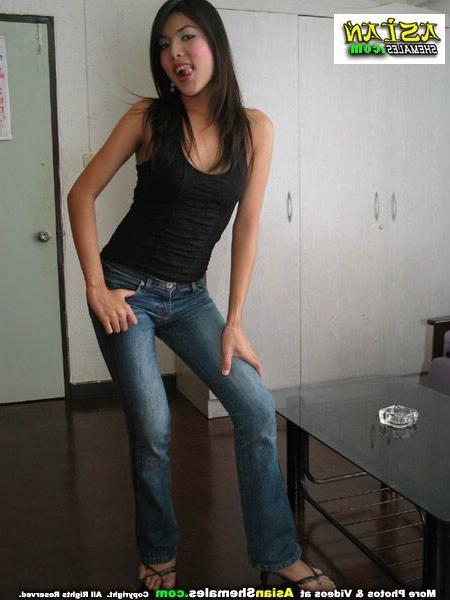 15P Feminine asian ladyboy strips and shows her cock