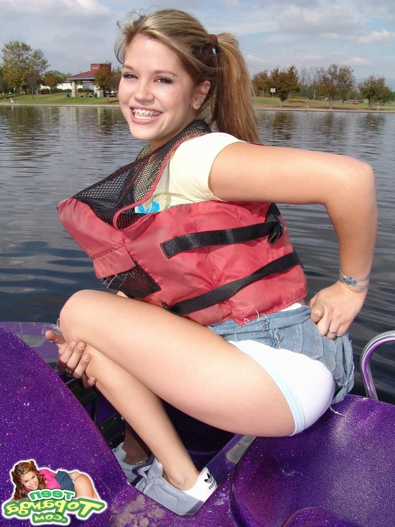 16P Upskirt panty view on a cute teen girl outdoors