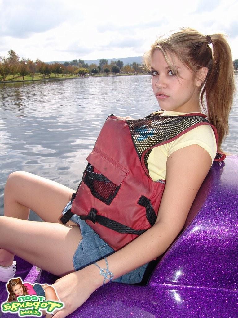 16P Upskirt panty view on a cute teen girl outdoors
