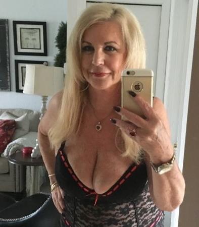13P Busty blonde granny selfies