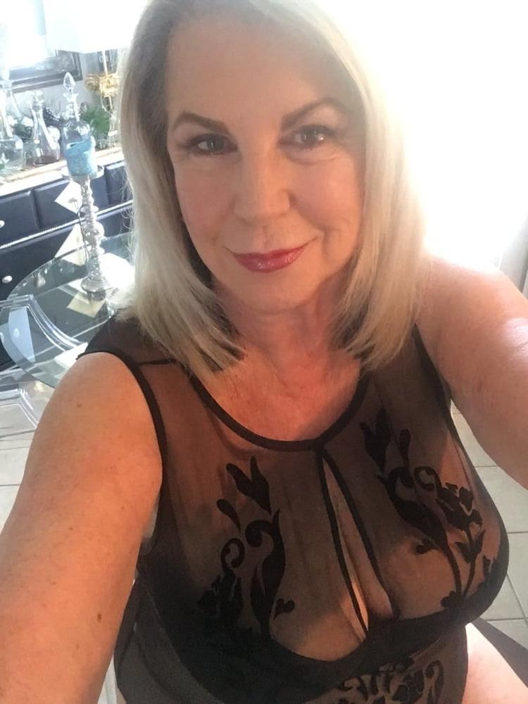 13P Busty blonde granny selfies