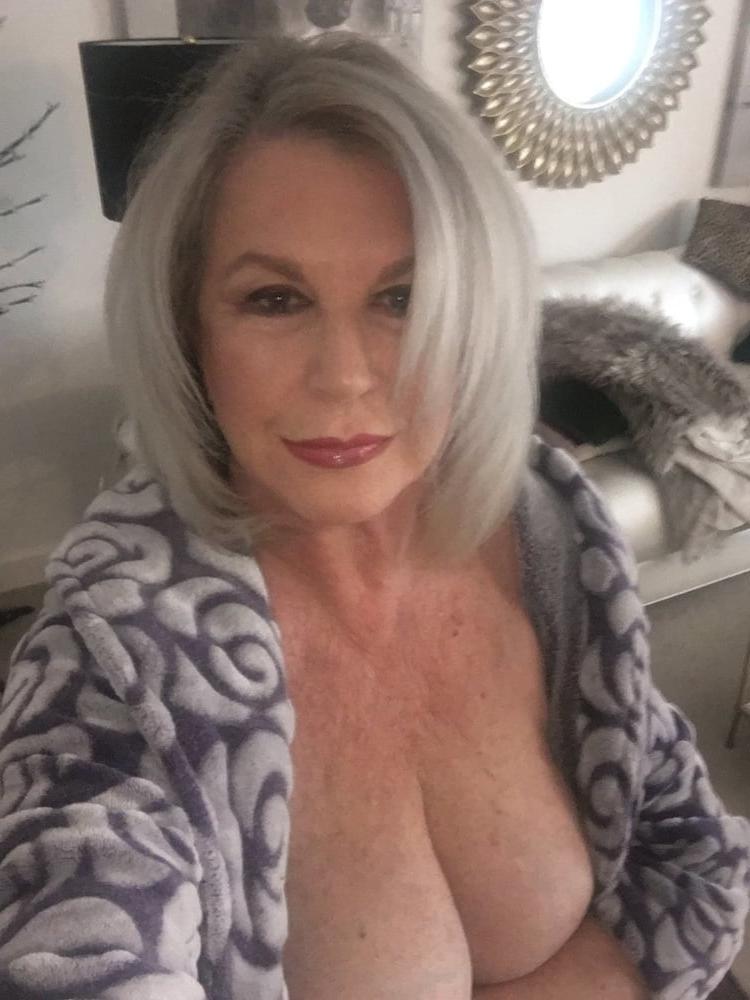 13P Busty blonde granny selfies