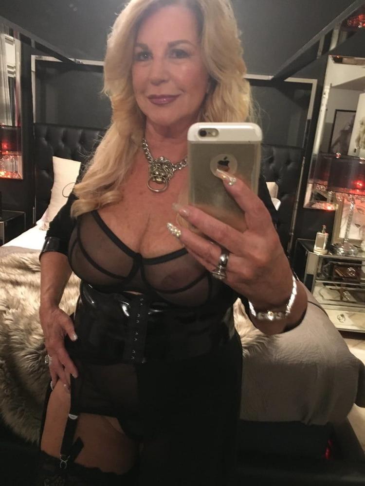13P Busty blonde granny selfies