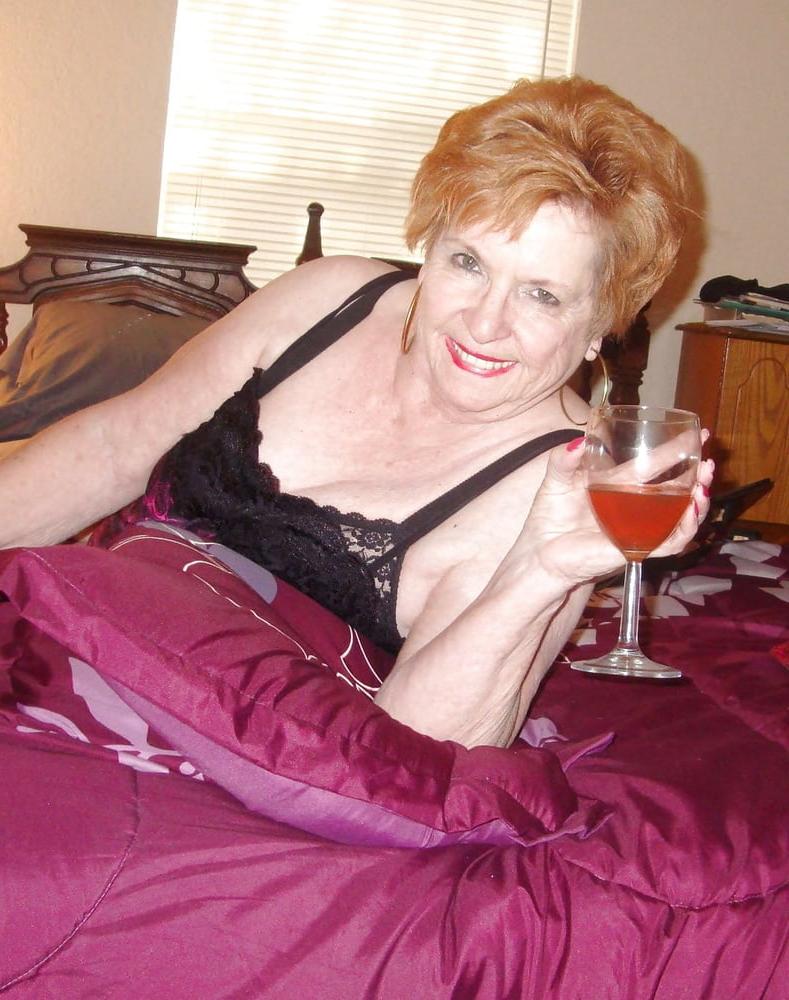 13P Non-nude Beautiful smiling granny redhead