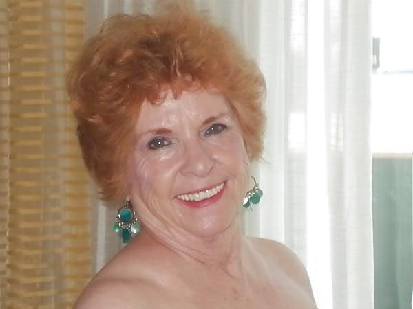 13P Non-nude Beautiful smiling granny redhead