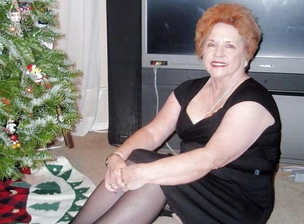 13P Non-nude Beautiful smiling granny redhead