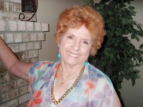 13P Non-nude Beautiful smiling granny redhead