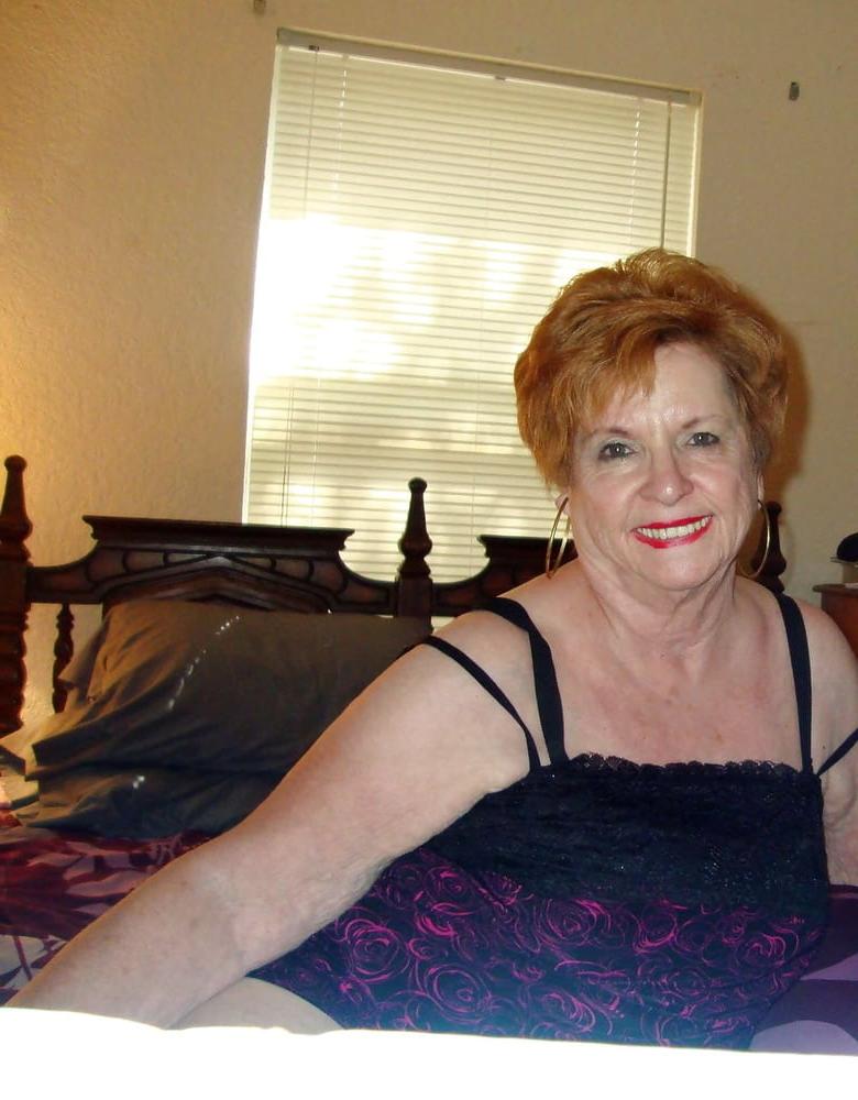 13P Non-nude Beautiful smiling granny redhead