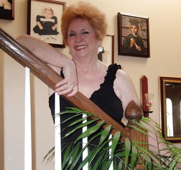 13P Non-nude Beautiful smiling granny redhead