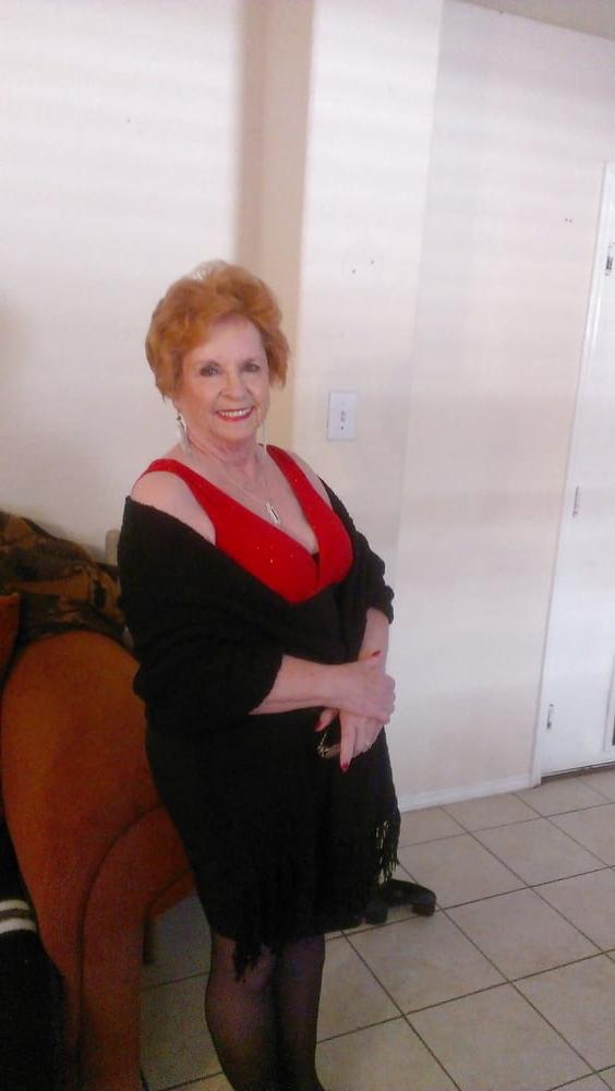 13P Non-nude Beautiful smiling granny redhead
