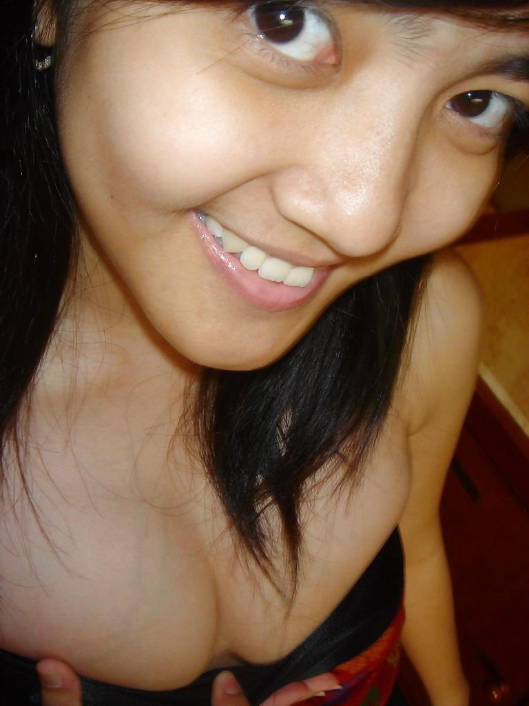 12P Young and very cute Asian babe!  