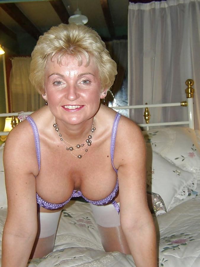 25P Truly stunning looking blonde granny with great rack