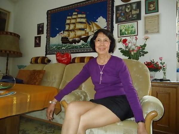 21P Beautiful non-nude asian granny posing