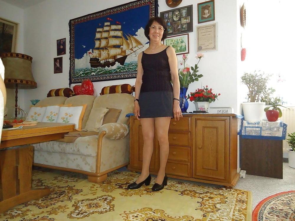 21P Beautiful non-nude asian granny posing