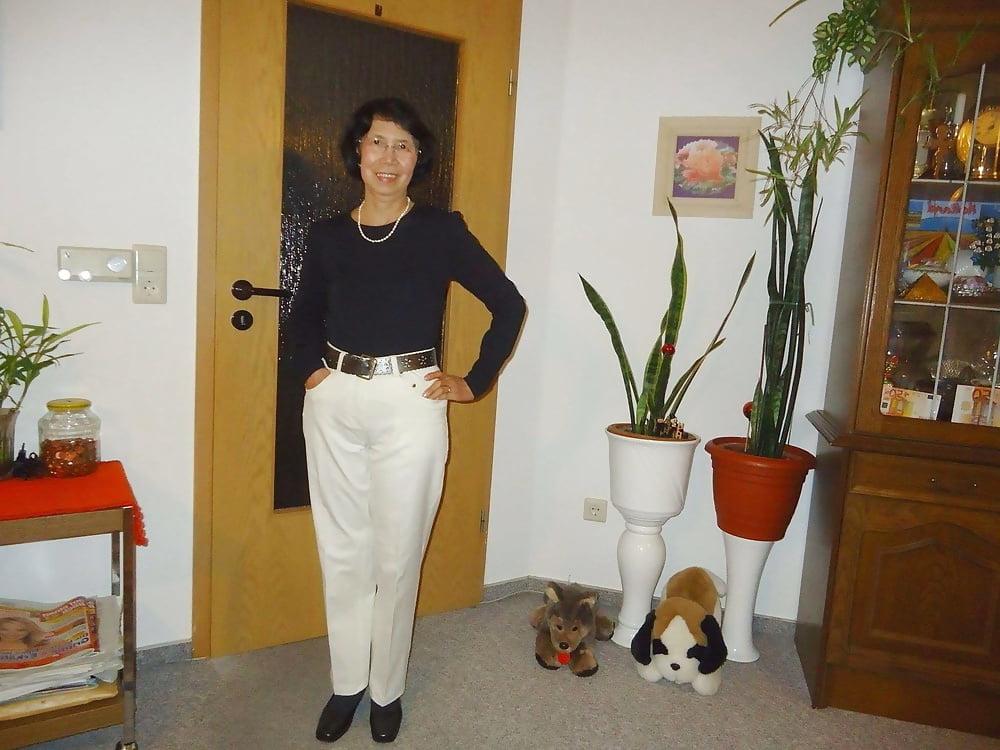 21P Beautiful non-nude asian granny posing