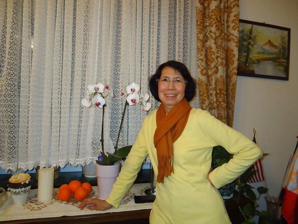 21P Beautiful non-nude asian granny posing
