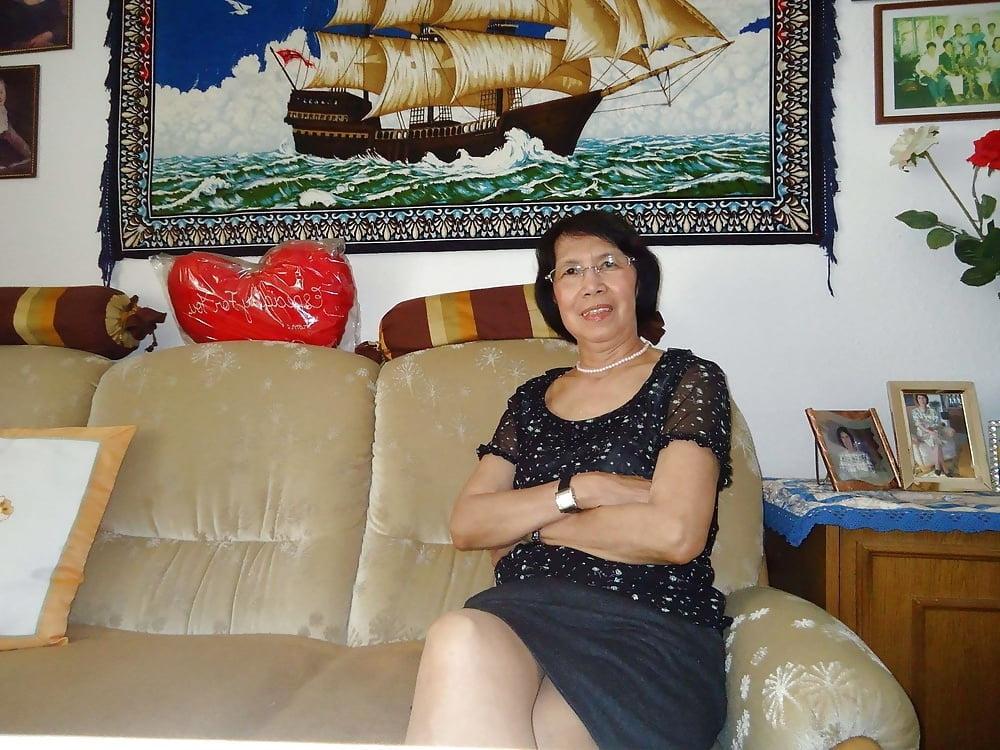 21P Beautiful non-nude asian granny posing