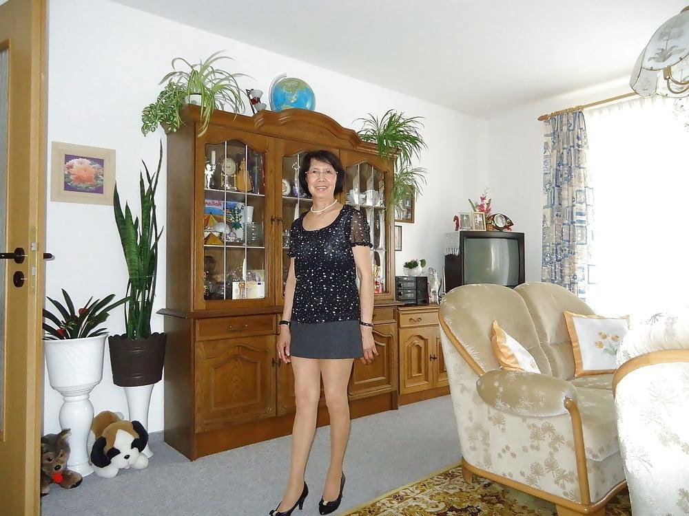 21P Beautiful non-nude asian granny posing