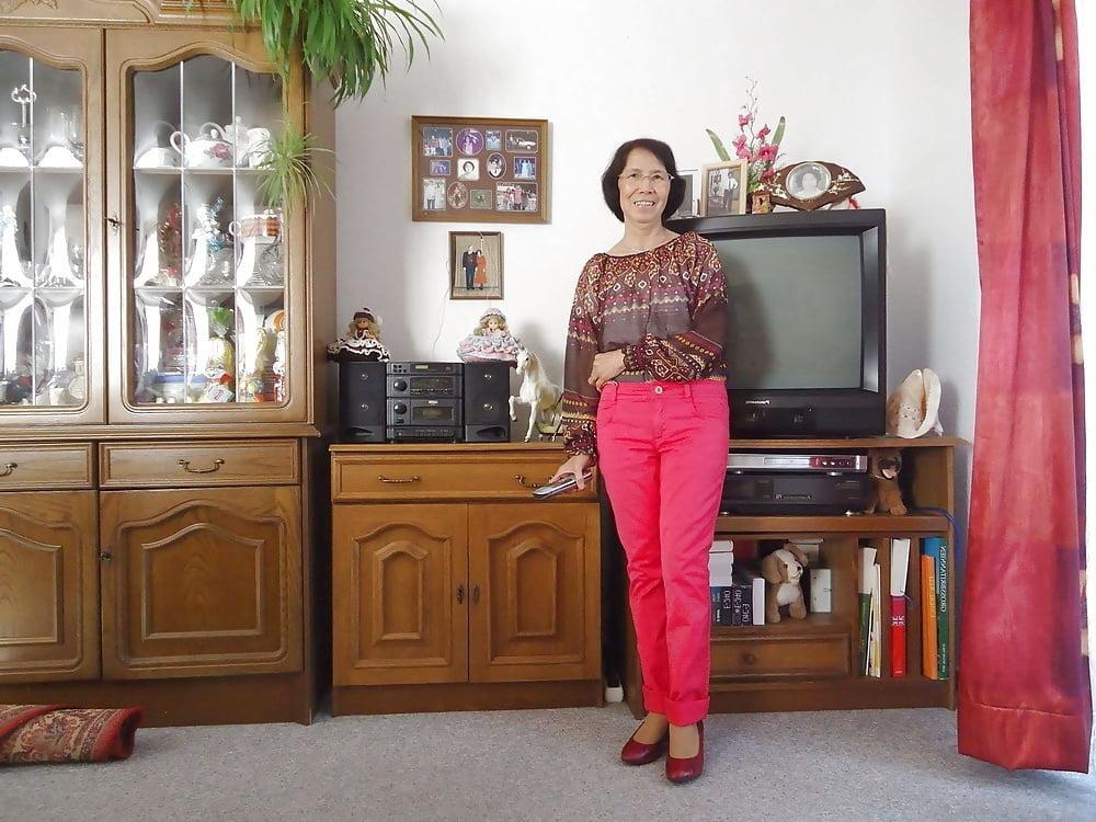 21P Beautiful non-nude asian granny posing