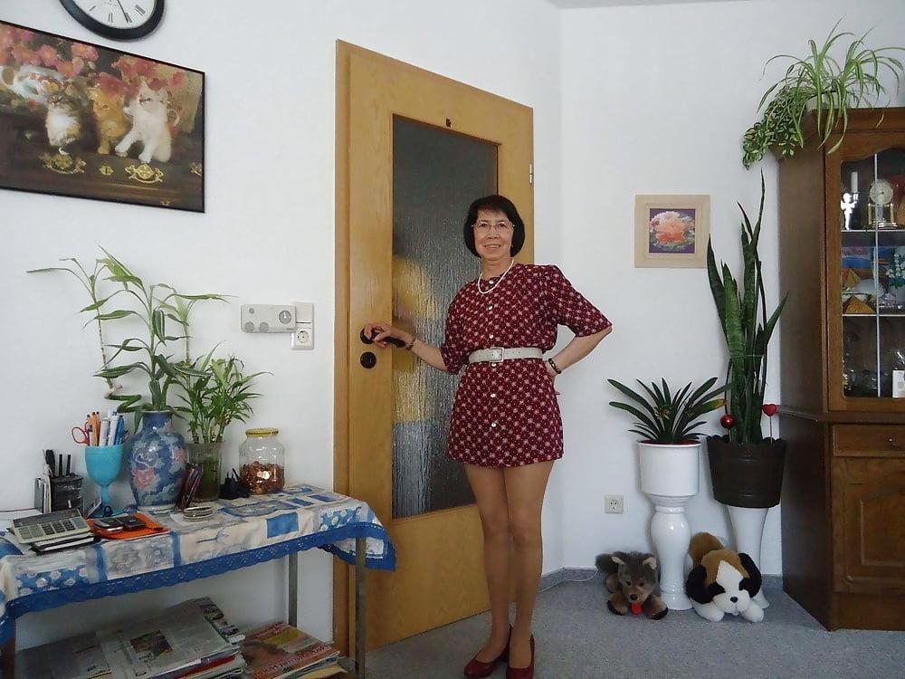 21P Beautiful non-nude asian granny posing