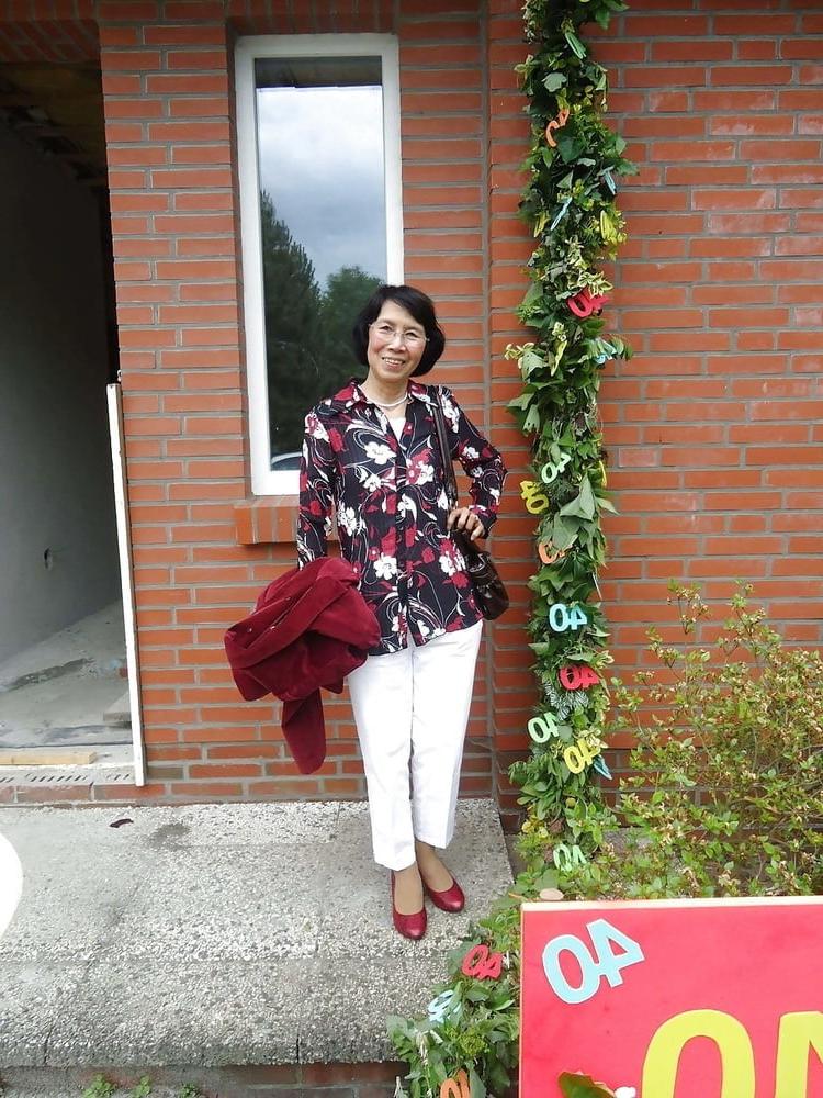21P Beautiful non-nude asian granny posing