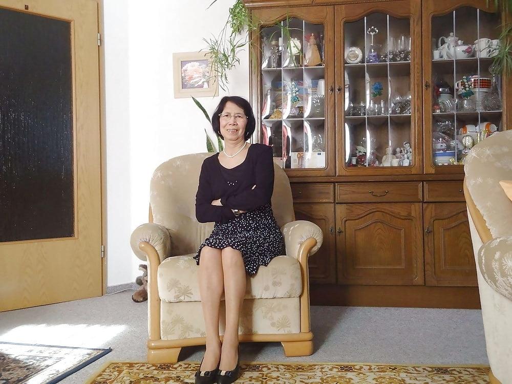 21P Beautiful non-nude asian granny posing