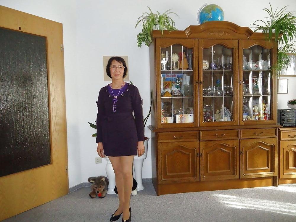 21P Beautiful non-nude asian granny posing