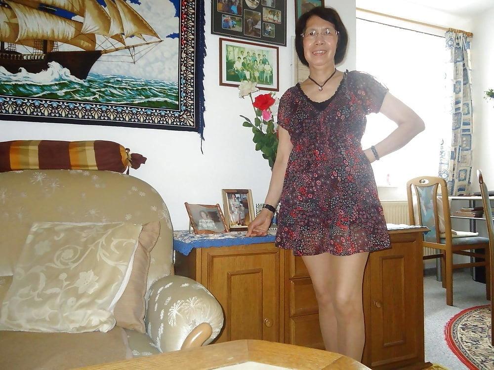 21P Beautiful non-nude asian granny posing