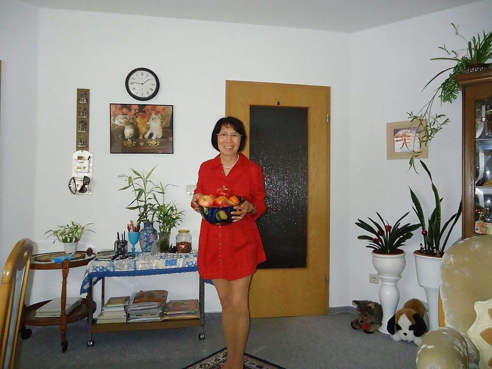 21P Beautiful non-nude asian granny posing