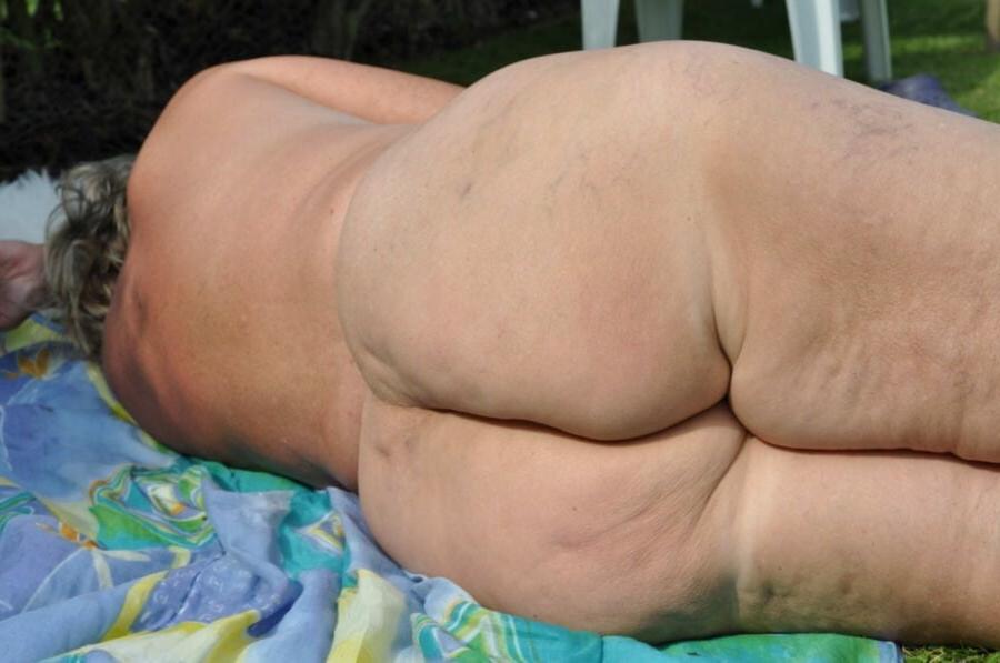 25P Nude Gardening Granny