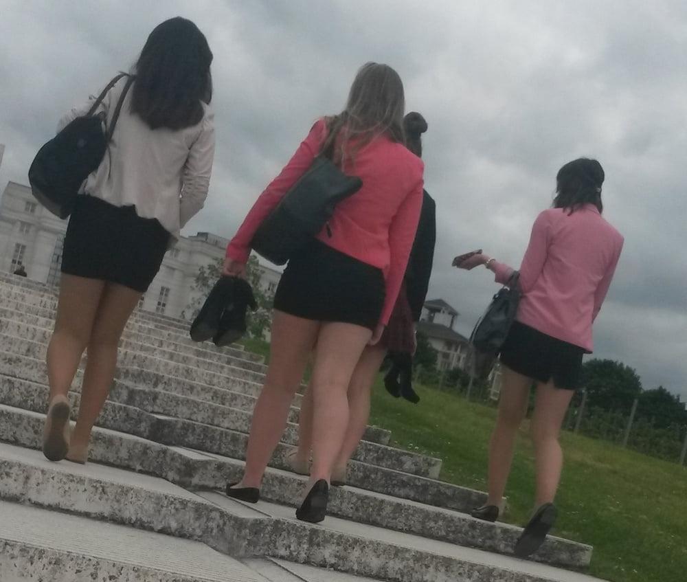 25P upskirt, young woman sitting we see her panties