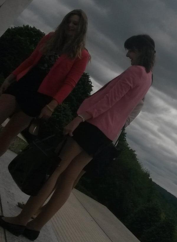 25P upskirt, young woman sitting we see her panties