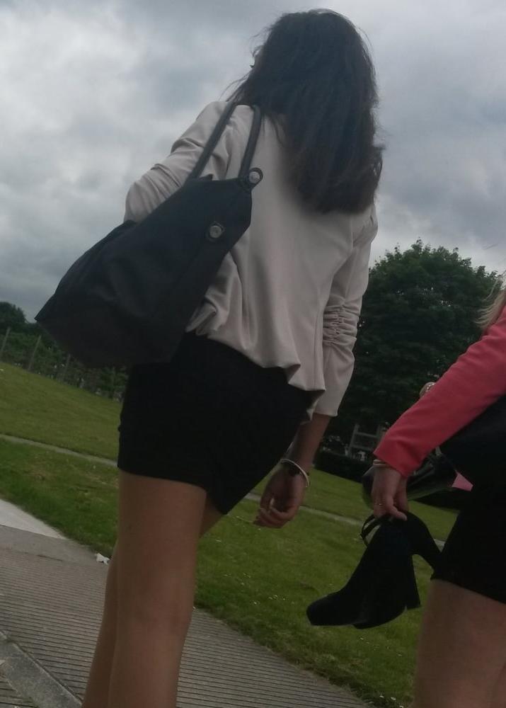 25P upskirt, young woman sitting we see her panties