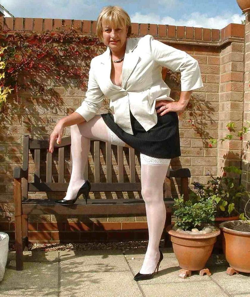 13P Hot granny stripping in backyard